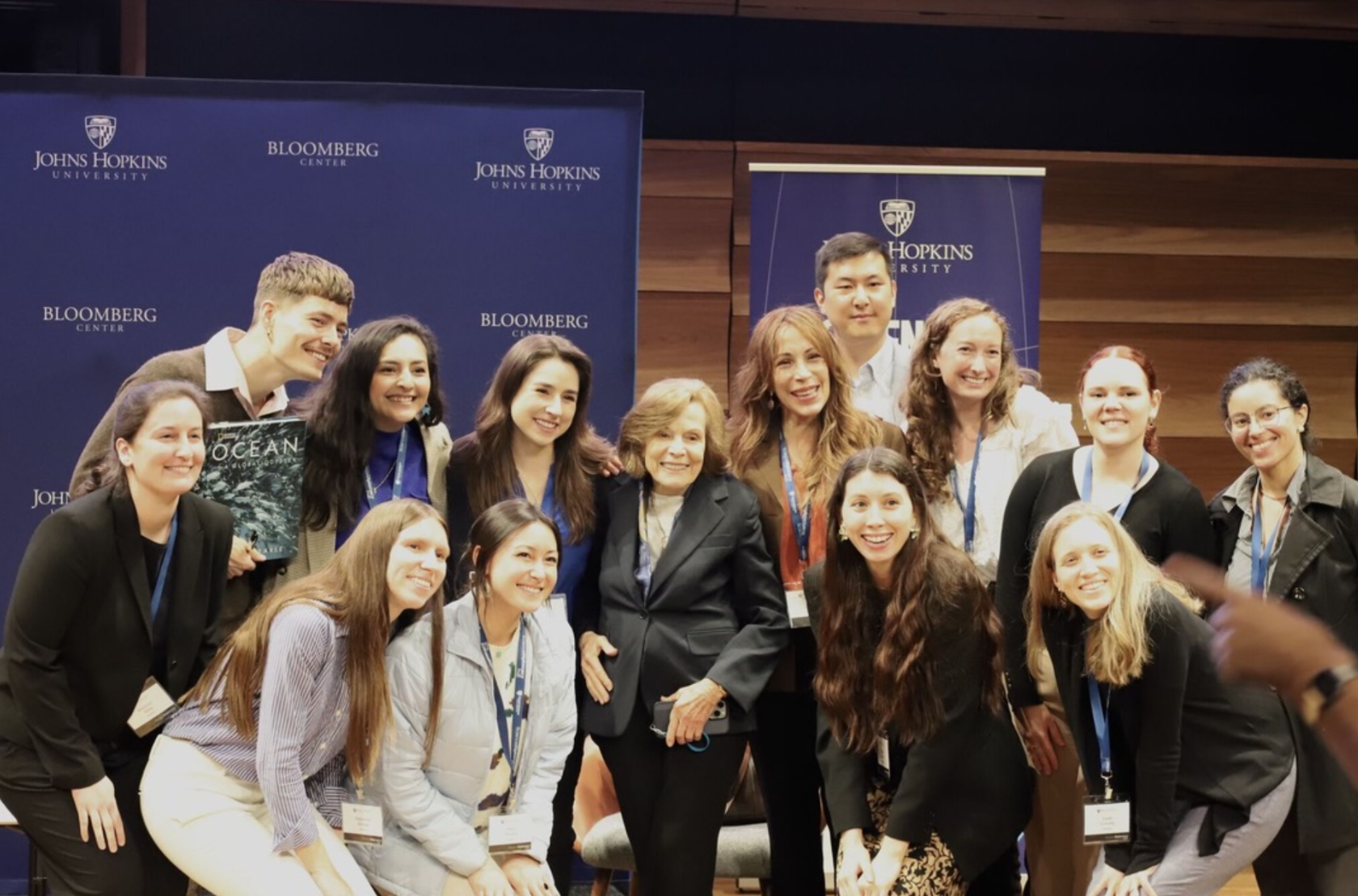 A collection of fellows and I standing next to marine science activist and legend, Dr. Sylvia Earle!
